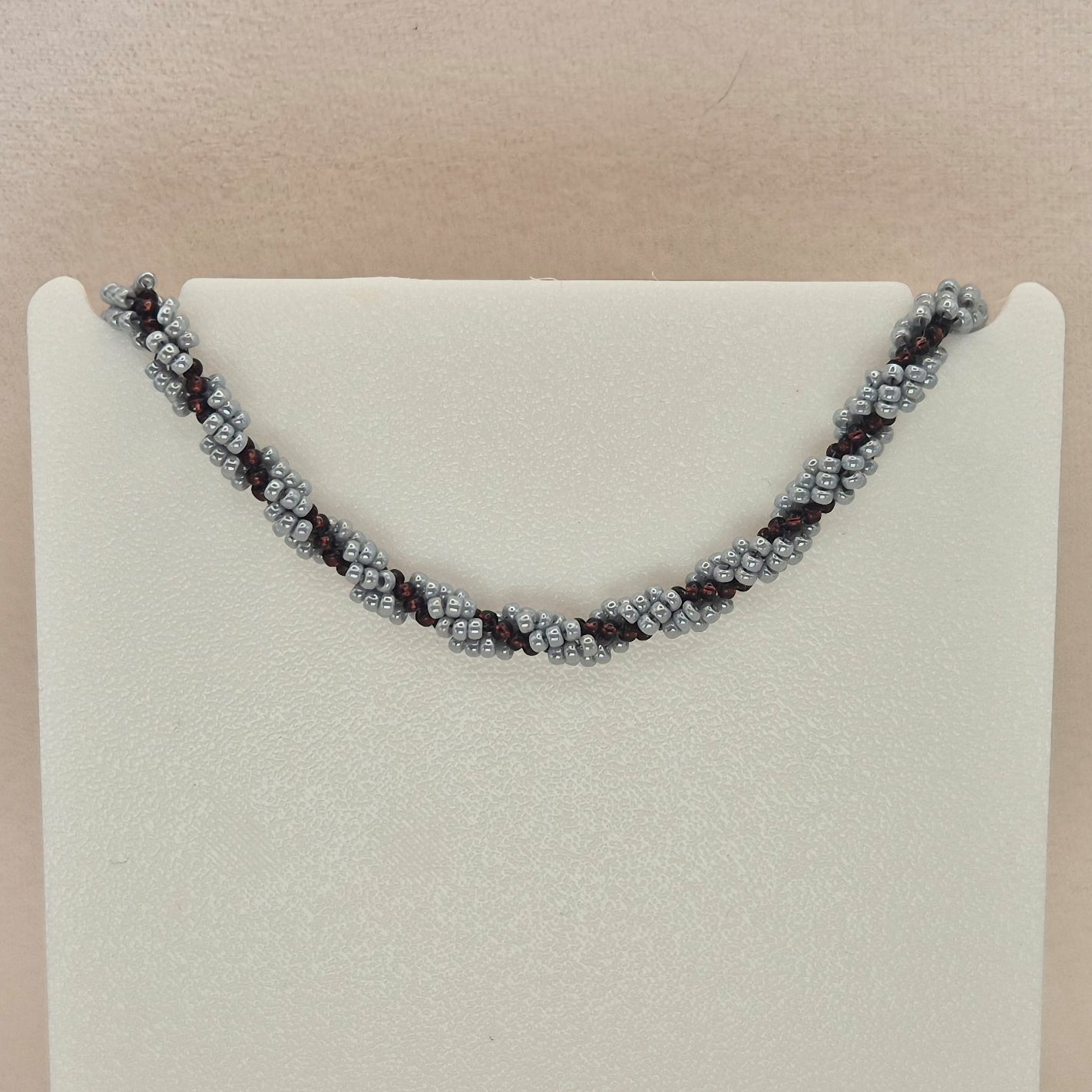 Armkette Spiral in Lila/Silber