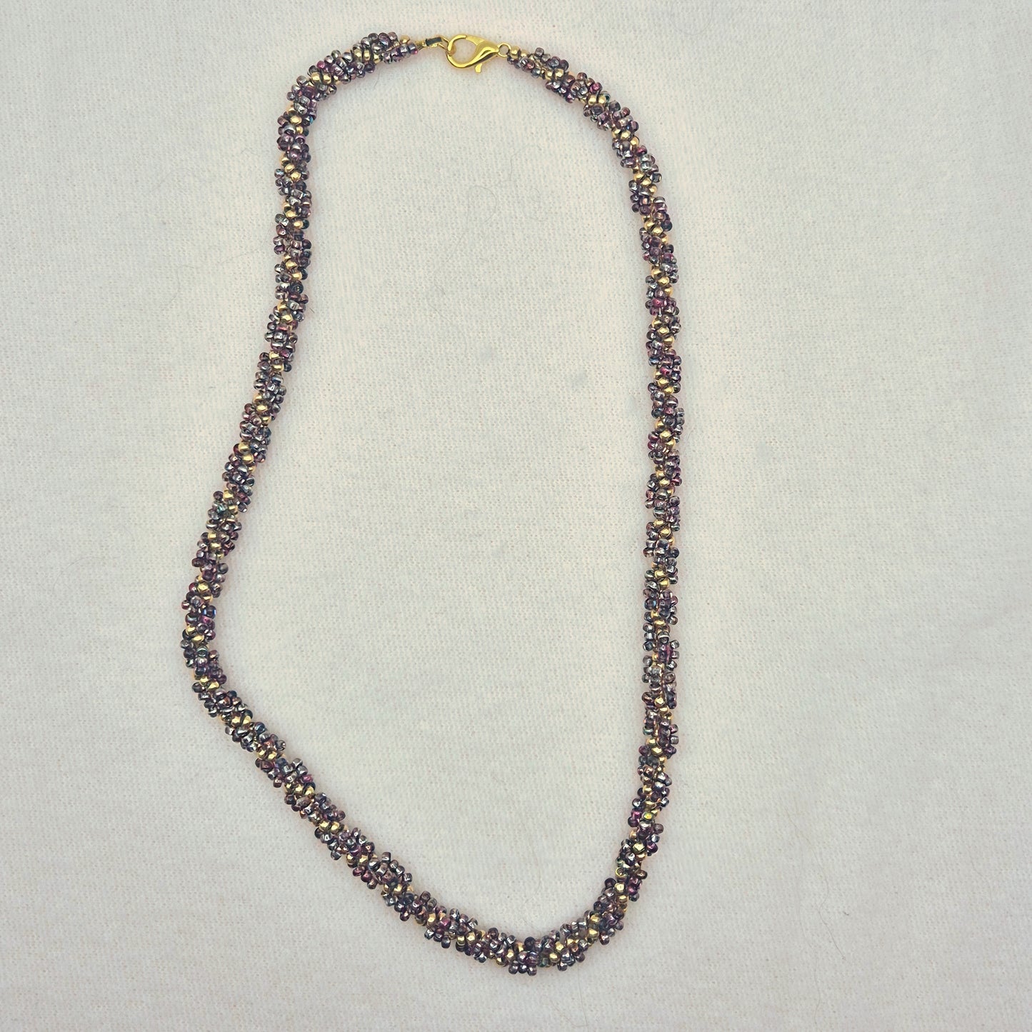 Halskette Spiral in Lila/Gold